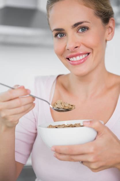 Premium Photo Smiling Woman Holding Bowl Of Cereal