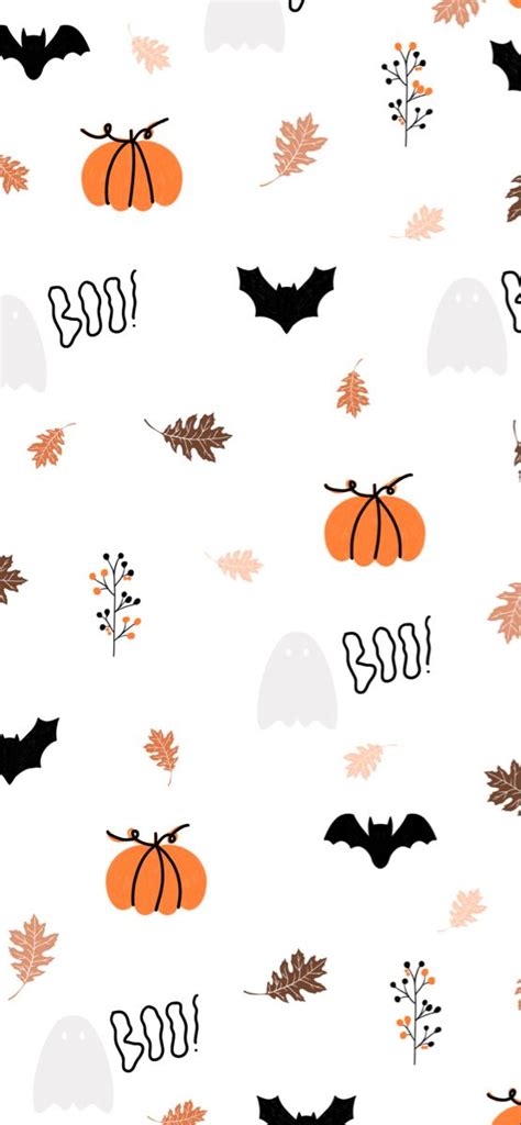 A White Background With Orange And Black Pumpkins Bats And Leaves On It