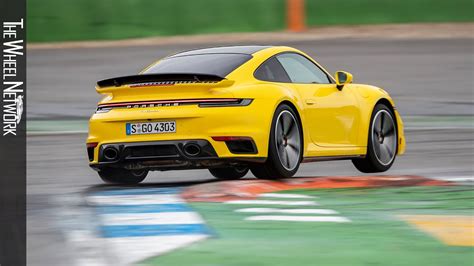 Porsche Turbo Racing Yellow Driving Interior Exterior