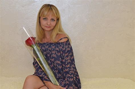 Beautiful Blonde Loves Beautiful Flowers Stock Photo Image Of Dress Female