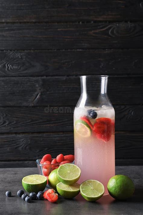 Natural Lemonade With Berries In Bottle On Table Stock Photo Image Of