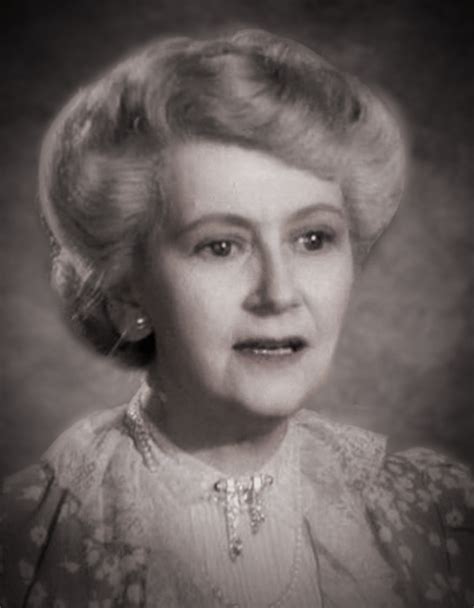 An Old Black And White Photo Of A Woman