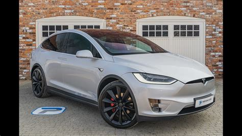 Tesla Model X D In Bright Silver Metallic With Black Interior