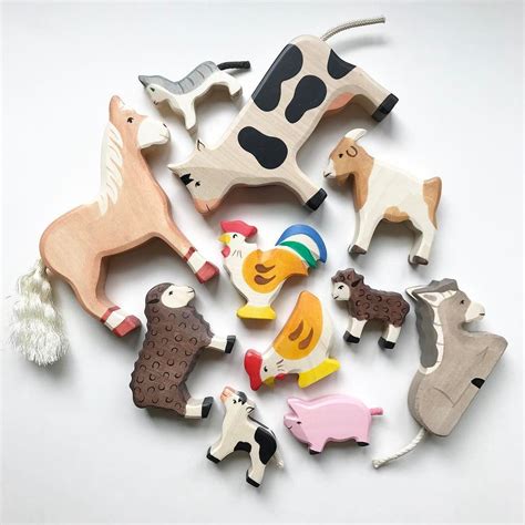 Die besten 25+ Wooden animal toys Ideen auf Pinterest