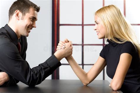 Man And Woman Arm Wrestling Stock Photo - Image of male, blond: 2856832