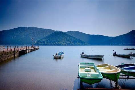 Premium Photo Boats In Calm Sea