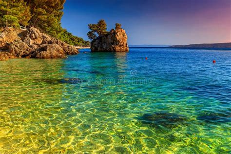 Rocky Shore With Crystal Clear Sea Water Brela Dalmatia Croatia Stock