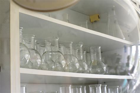 Empty Clean Laboratory Glassware Many Flasks On The Shelves Of Wall Cabinets Stock Image Image