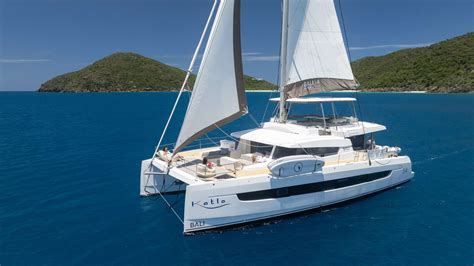 Learn About A Crewed Charter Aboard KATLO A 55 Ft Sailing Catamaran