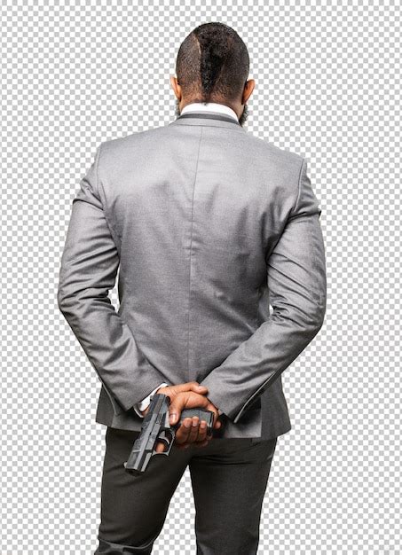 Business black man holding a gun | Premium PSD File