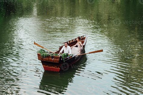 A Boat Trip For A Guy And A Girl Along The Canals And Bays Of The River