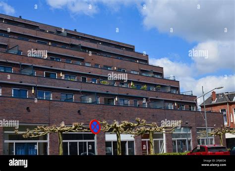 Exterior Of Beautiful Red Brick Apartment Building On Sunny Day Stock