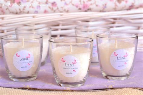 Four Candles Sitting On Top Of A Table