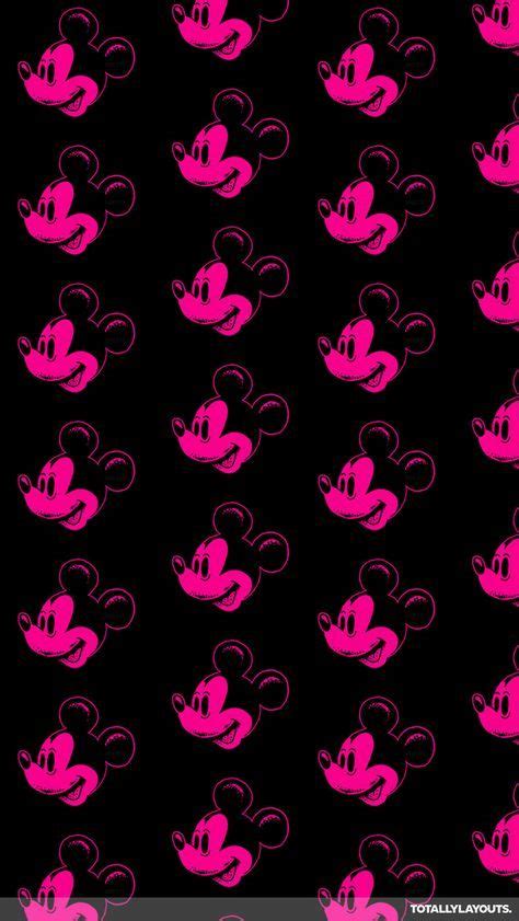 Pink And Black Mickey Mouse Wallpaper With The Silhouettes Of Two Heads