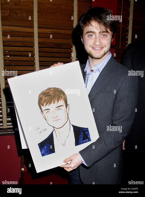 Daniel Radcliffe receives his portrait celebrating his performance in ...