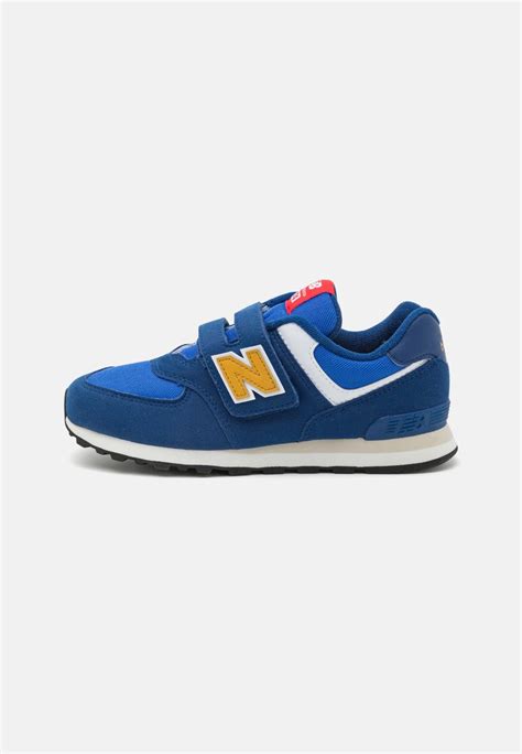 New Balance 574 Unisex Sneakers Basse Blue Yellow Blu Zalando It