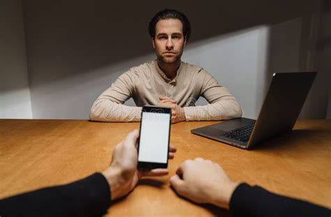 Serious Brunette Entrepreneur Sitting In The Office Stock Photo Image