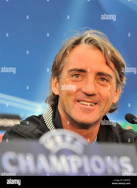 Manchester City Manager Roberto Mancini During A Press Conference At