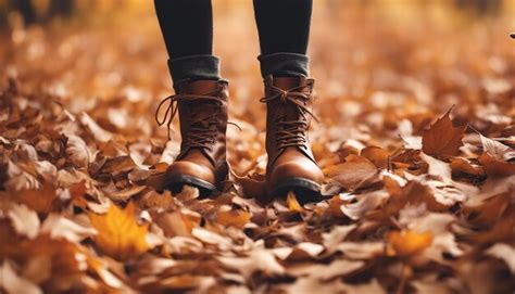 Premium Photo Conceptual Image Of Legs In Boots On The Autumn Leaves