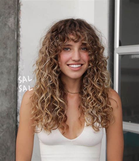 Long Natural Curly Hairstyles With Bangs