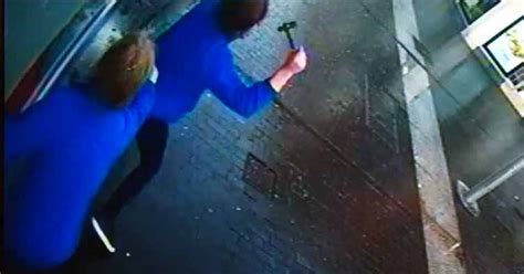 Dramatic Moment Axe Wielding Robber Smashes Pawn Shop Window And Is