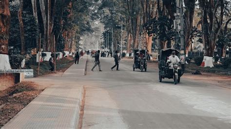 Premium Photo People Walking At Paris Road Rajshahi University