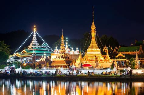 Premium Photo Lake With Wat Chong Klang And Wat Chong Kham Temples At