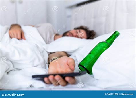 Texting While Drunk Concept Young Man Lying In Bed Deadly Drunken