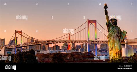 Statue Of Liberty Rainbow Bridge And Tokyo Tower As Seen From Odaiba