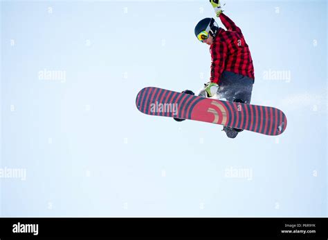 Image Of Young Athlete Jumping With Snowboard Stock Photo Alamy