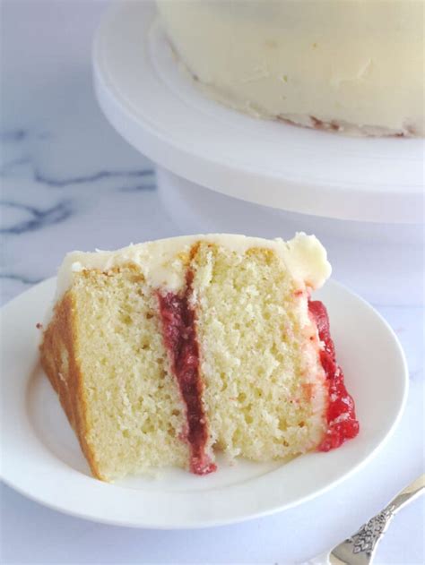 White Cake With Strawberry Filling Nina Kneads To Bake