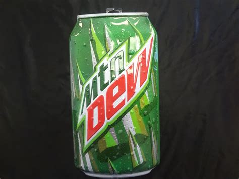 Mountain Dew soda can sign