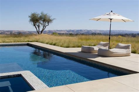 18 Dazzling Modern Swimming Pool Designs - The Ultimate Backyard Refreshment