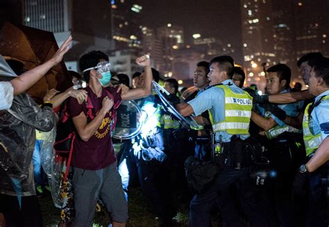 Riot Police Pepper Spray Hong Kong Protesters Arrest Dozens Cbs News