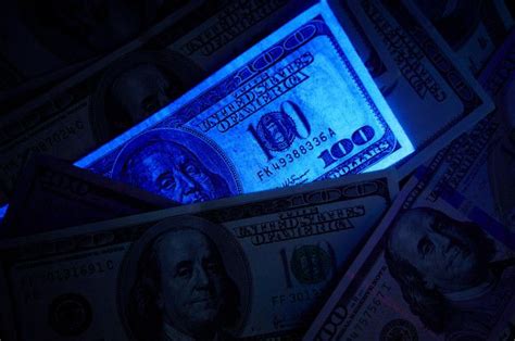 Premium Photo Fake Us Dollar Bill In Uv Light Light Blue Aesthetic