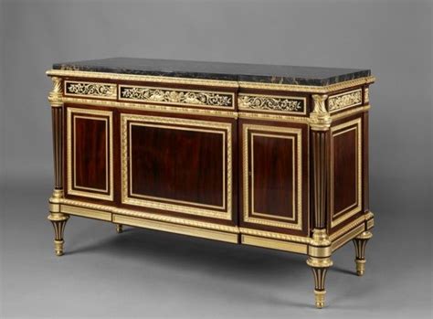 A Louis Xvi Style Gilt Bronze Mounted Mahogany And Ebony Exhibition