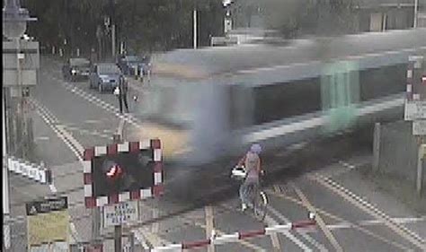 Video Shocking Moment A Cyclist Was Seconds From Being Hit By A Train