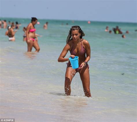Sylvie Van Der Vaart Sizzles In A String Bikini As She Clowns Around