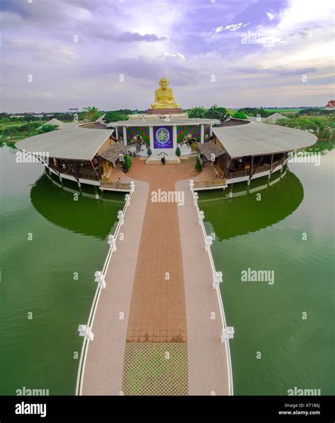 The statue monk in temple Stock Photo - Alamy