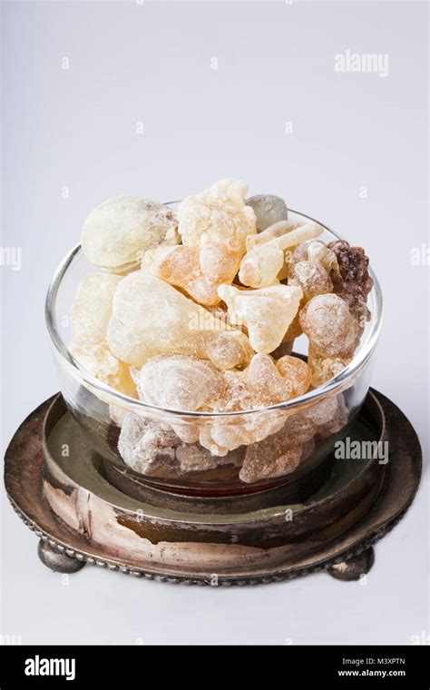 Frankincense burning on a hot coal. Frankincense is an aromatic resin ...