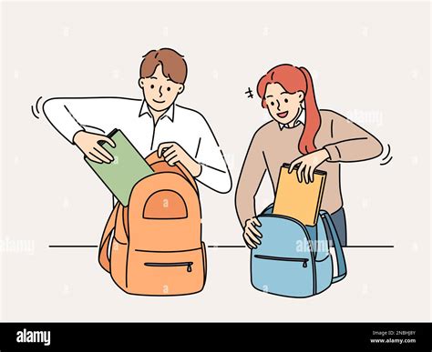 Smiling Students Pack Backpacks In School Or College Happy Pupils Put