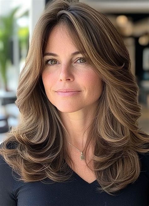 35 Layered Haircuts For Women Over 40 Deep Chestnut Cascading Layers