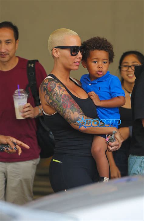 Amber Rose Hugs And Kisses Son Sebastian At Airport After Being Apart