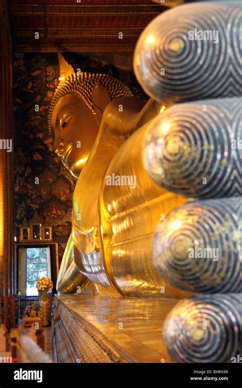 Feet of the Golden Reclining Buddha statue at the Wat Pho Temple ...