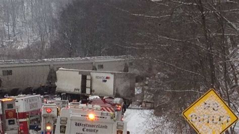 Hazmat Crews Respond After Tractor Trailer Train Collide