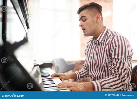 Talented guy stock image. Image of piano, singing, handsome - 107730441