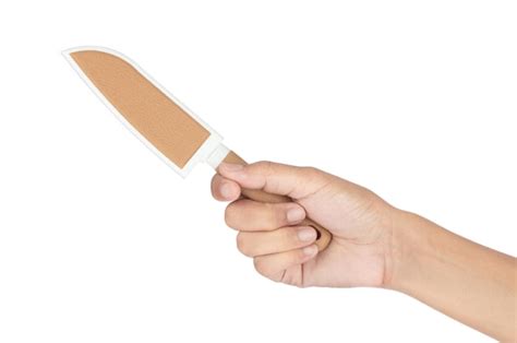 Premium Photo Hand Holding Brown Knife With A Brown Knife Sheath On A