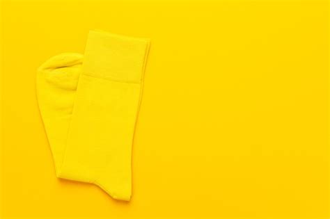 Premium Photo Pair Of Yellow Socks