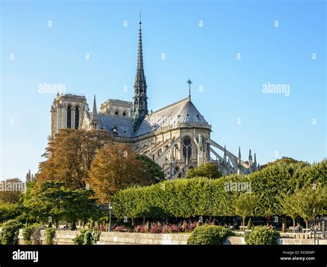 Three Quarter Rear View Of Notre Dame De Paris Cathedral By A Sunny