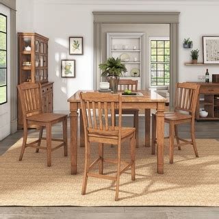 Elena Oak Extendable Counter Height Dining Set With X Back Chairs By